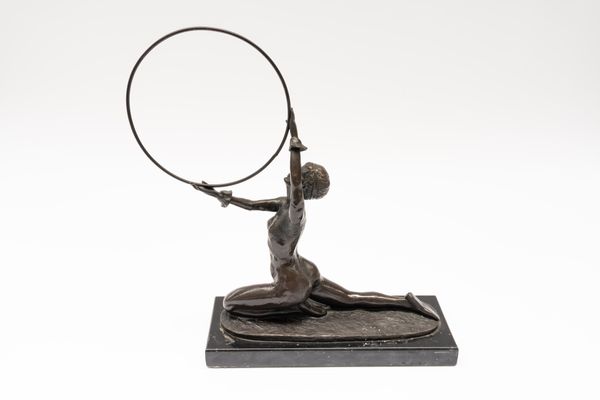 AFTER FERDINAND PREISS, A CAST BRONZE MODEL OF A HOOP DANCER, ON MARBLE BASE