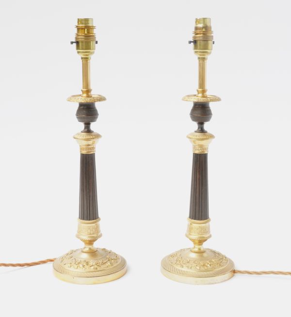 A PAIR OF FRENCH RESTAURATION STYLE GILT BRONZE TABLE LAMPS (2)