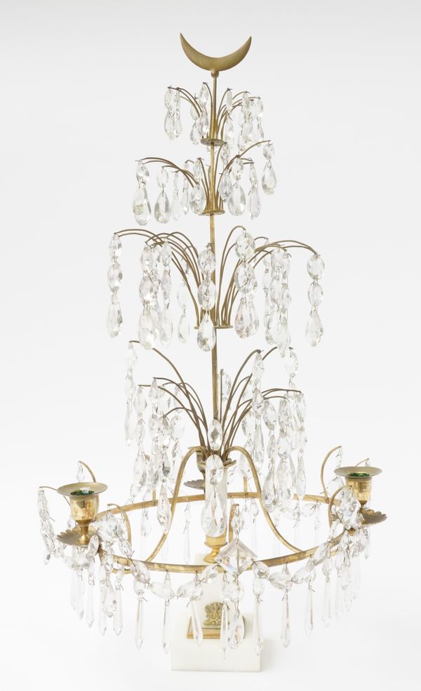 A SWEDISH BRASS AND WHITE MARBLE MOUNTED THREE LIGHT CANDELABRUM