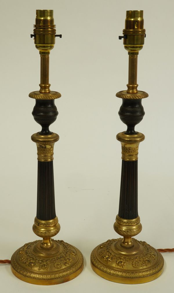 A PAIR OF FRENCH RESTAURATION STYLE GILT BRONZE TABLE LAMPS (2)