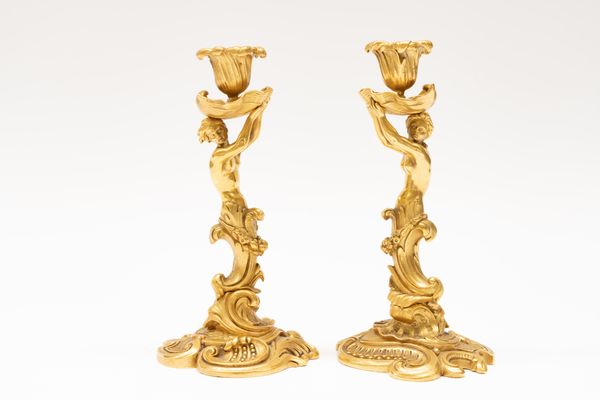 A PAIR OF GILT-BRONZE ROCOCO REVIVAL CARYATID CANDLESTICKS (2)