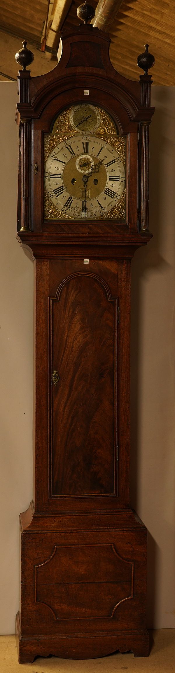 A MAHOGANY LONGCASE CLOCK WITH BRASS DIAL MOVEMENT