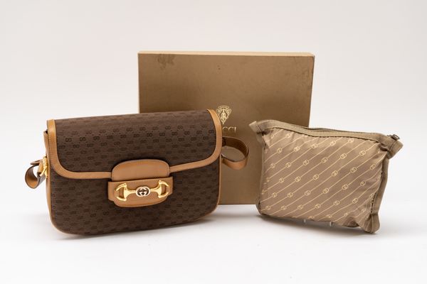 GUCCI- A HORSEBIT 1955 SHOULDER BAG AND A TRAVEL DUFFEL CASE IN BAG (2)