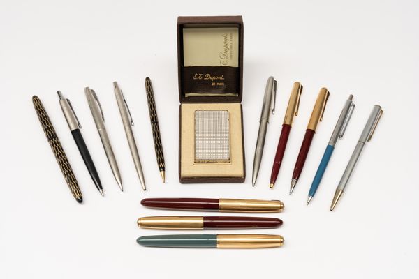 A SILVER-PLATED DUPONT LIGHTER AND A GROUP OF MAINLY PARKER AND SCHAEFFER PENS (14)