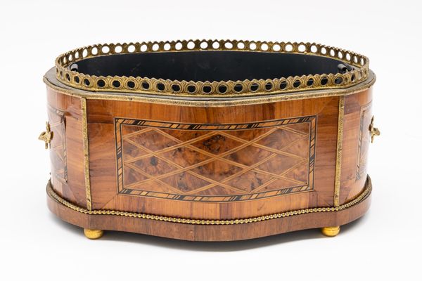 A FRENCH LOUIS XVI STYLE GILT-METAL MOUNTED TULIPWOOD AND MARQUETRY JARDINIERE