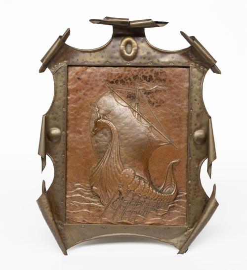 AN ARTS AND CRAFTS REPOUSSÉ COPPER PANEL, IN THE MANNER OF LIBERTY & CO.