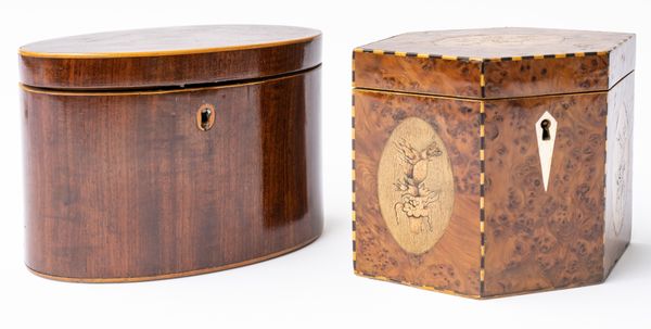 A GEORGE III INLAID BURR YEW WOOD COMPRESSED HEXAGONAL SINGLE CADDY (2)