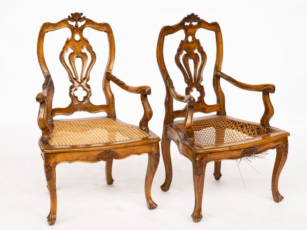 A PAIR OF 19TH CENTURY ITALIAN WALNUT PIERCED VASE BACK OPEN ARMCHAIRS (2)