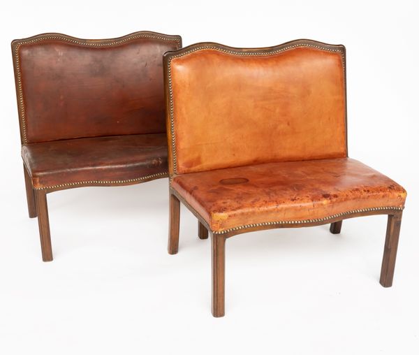 A NEAR PAIR OF 19TH CENTURY FRENCH RED LEATHER UPHOLSTERED WALNUT HALL BENCHES (2)