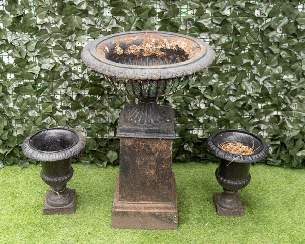 A LATE 19TH CENTURY BLACK PAINTED CAST IRON JARDINIERE ON STEPPED SQUARE STAND (3)