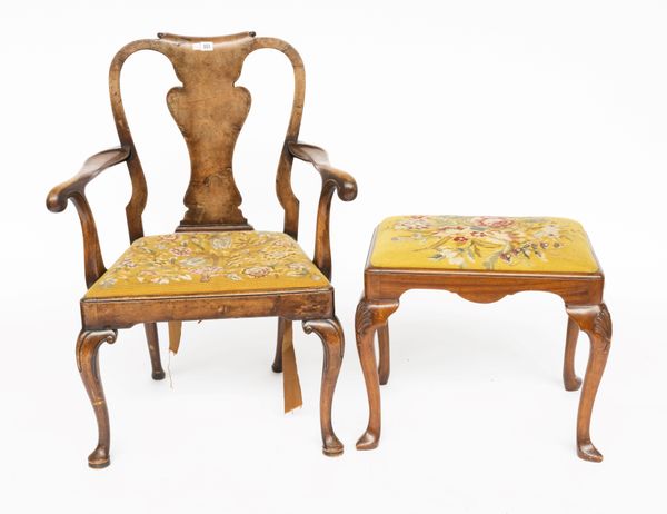 AN EARLY 20TH CENTURY QUEEN ANNE STYLE WALNUT OPEN ARMCHAIR AND GEORGE II STYLE WALNUT STOOL (2)