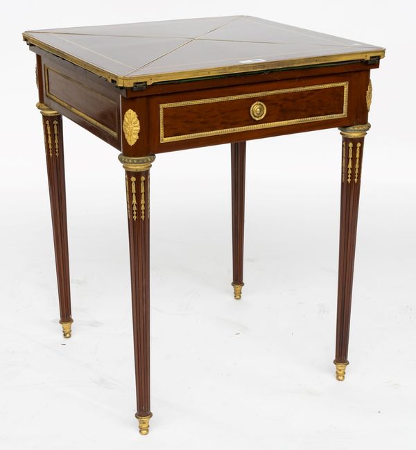 A LOUIS XVI STYLE GILT-METAL MOUNTED MAHOGANY ENVELOPE CARD TABLE