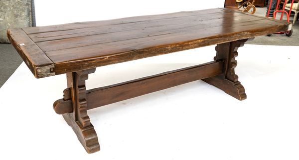 A STAINED PINE PLANK TOP REFECTORY TABLE