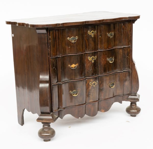 AN 18TH CENTURY DUTCH WALNUT SHAPED THREE DRAWR COMMODE