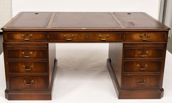 AN 18TH CENTURY STYLE MAHOGANY PEDESTAL PARTNER’S DESK