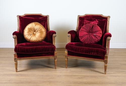 PROVASI: A PAIR OF FRENCH TRANSITIONAL STYLE GILT FRAMED ARMCHAIRS (2)