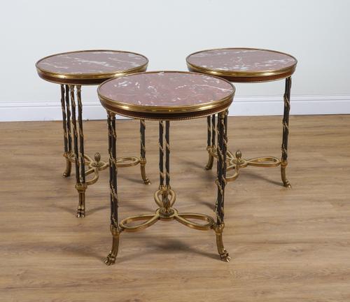 PROVASI: A TRIO OF CIRCULAR ROUGE MARBLE TOPPED OCCASIONAL TABLES/GUERIDONS (3)