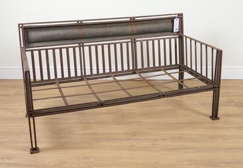 IN THE MANNER OF FRANK LLOYD WRIGHT: A BOX METAL FRAMED BENCH