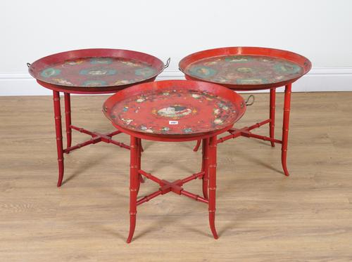 THREE SCARLET AND FLORAL POLYCHROME PAINTED OVAL TIN TRAYS (3)