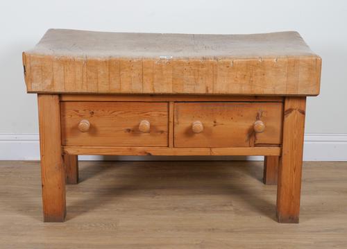 A RECTANGULAR PINE BUTCHER'S BLOCK