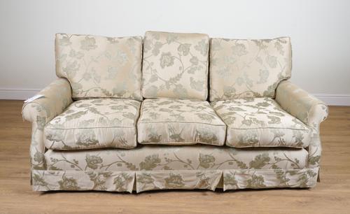 A MODERN FLORAL UPHOLSTERED THREE SEAT SOFA