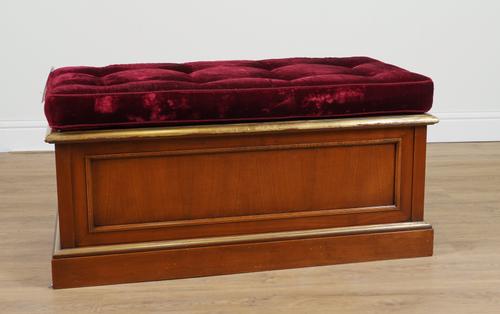 PROVAS: A BURGUNDY UPHOLSTERED PARCEL GILT MAHOGANY RECTANGULAR LIFT TOP OTTOMAN