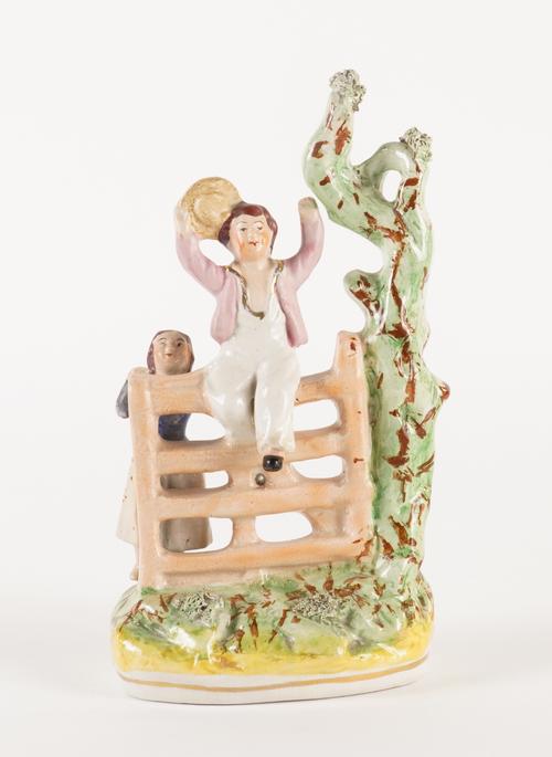 `HAPPY AS A KING' A RARE STAFFORDSHIRE POTTERY GROUP