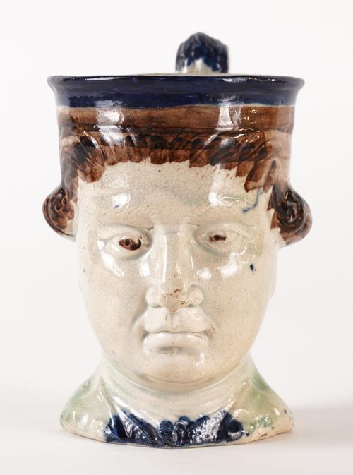 A STAFFORDSHIRE PEARLWARE ADMIRAL RODNEY MASK JUG
