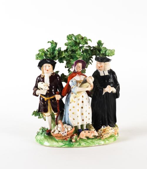 A DERBY PORCELAIN TYTHE PIG GROUP