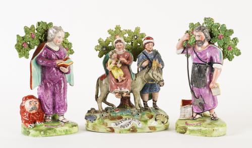 A WALTON PEARLWARE GROUP OF `RETURN FROM EGYPT'