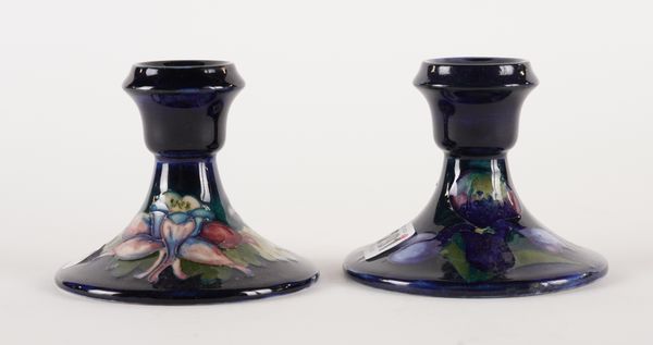 TWO MOORCROFT CANDLESTICKS (2)