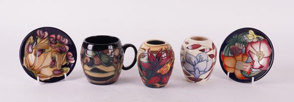 A GROUP OF LATE MOORCROFT POTTERY AND ENAMEL BOXES