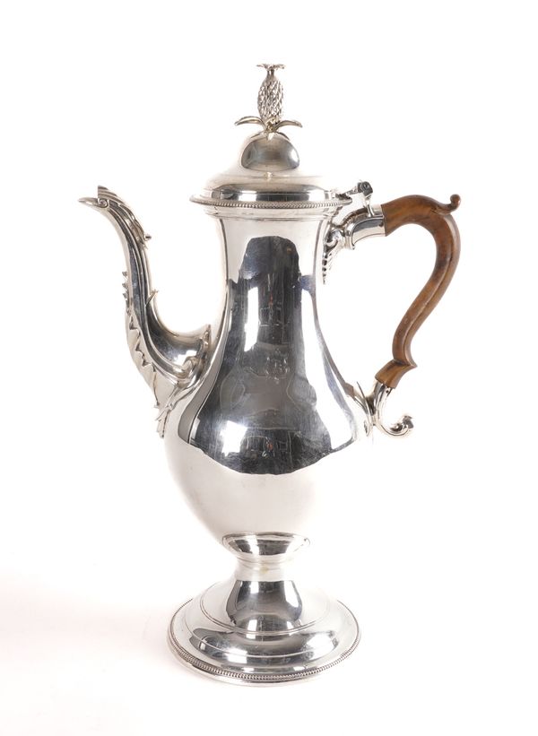 A GEORGE III SILVER COFFEE POT