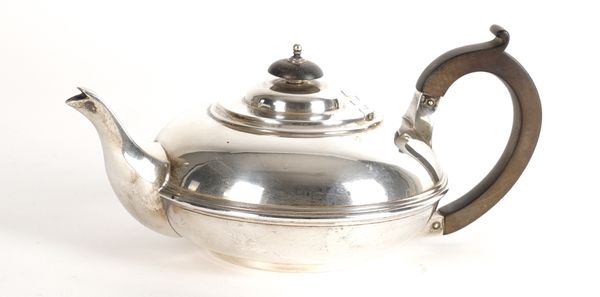 A SILVER TEAPOT