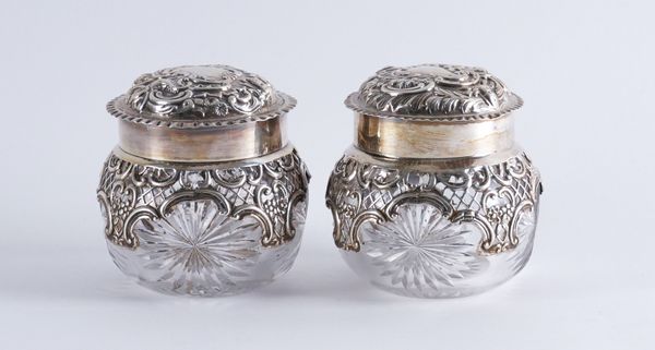 TWO SIMILAR LATE VICTORIAN SILVER MOUNTED DRESSING TABLE JARS (2)