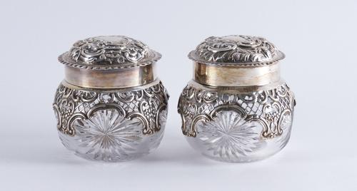 TWO SIMILAR LATE VICTORIAN SILVER MOUNTED DRESSING TABLE JARS (2)