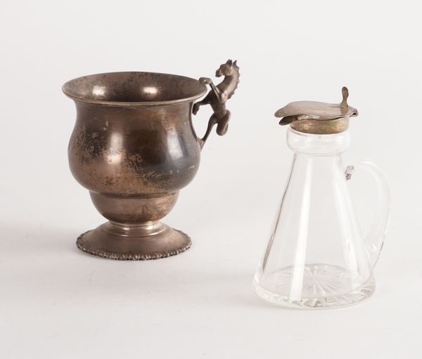 A SILVER MUG AND A SILVER MOUNTED GLASS WHISKY FLAGON (2)