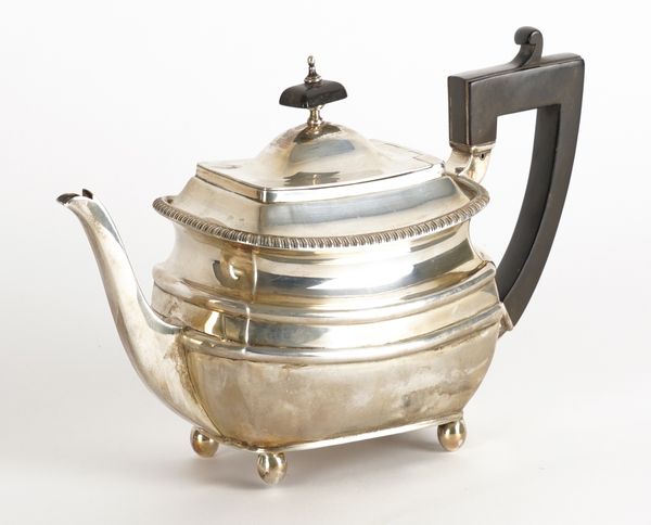 A SILVER TEAPOT