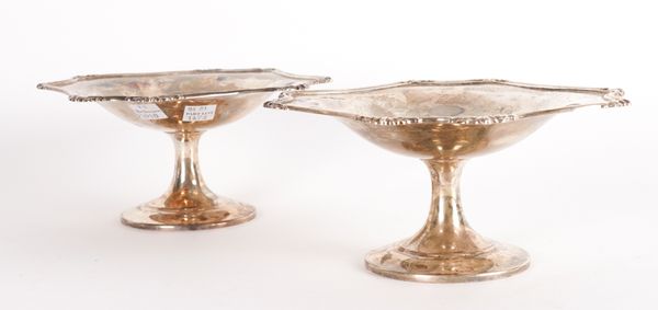 A PAIR OF SILVER PEDESTAL TAZZAE (2)