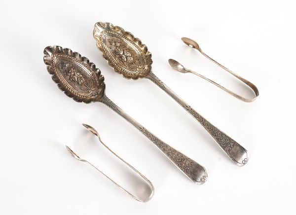 A PAIR OF SILVER BERRY FRUIT SERVING SPOONS AND TWO PAIRS OF SILVER SUGAR TONGS (4)