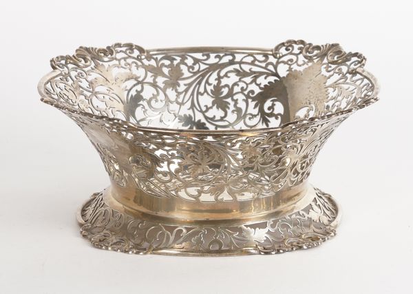 A SILVER SHAPED CIRCULAR BOWL