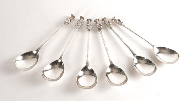 SIX SILVER FIGURE TERMINAL SPOONS (6)