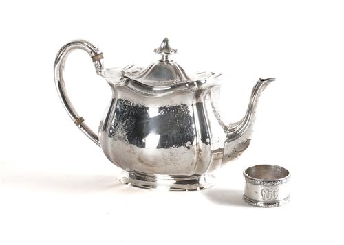 A SILVER TEAPOT AND A SILVER NAPKIN RING (2)