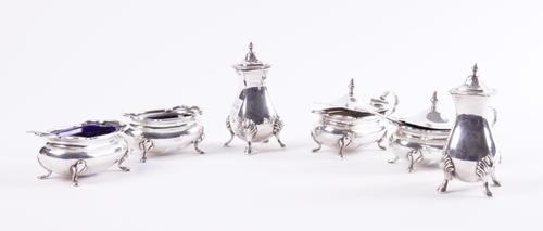 A GROUP OF SILVER CONDIMENTS (9)