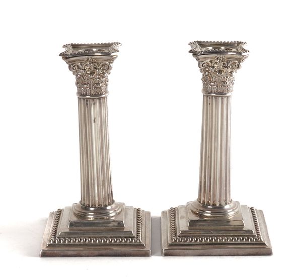 A PAIR OF VICTORIAN SILVER CANDLESTICKS