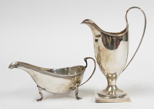 A SILVER CREAM JUG AND A SILVER SAUCEBOAT (2)