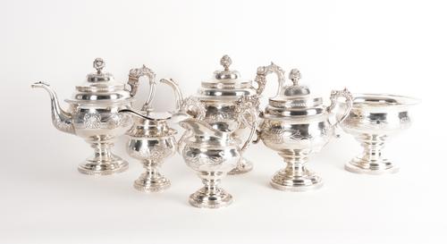 A FOREIGN SIX PIECE COMPOSITE SILVER TEA SET