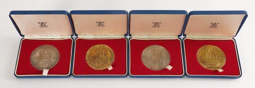 TWO SILVER GILT AND TWO SILVER MEDALLIONS (4)