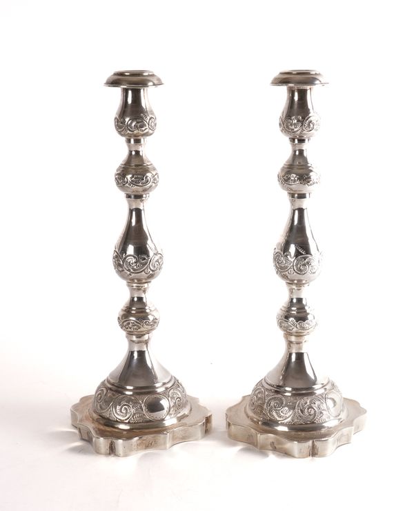 A PAIR OF SILVER TABLE CANDLESTICKS