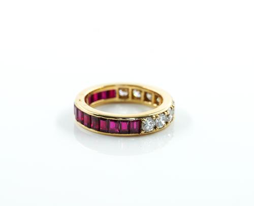 A FRENCH GOLD, RUBY AND DIAMOND ETERNITY RING